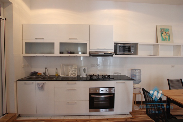 Bright duplex apartment for lease in Westlake area, Hanoi, fully furnished.